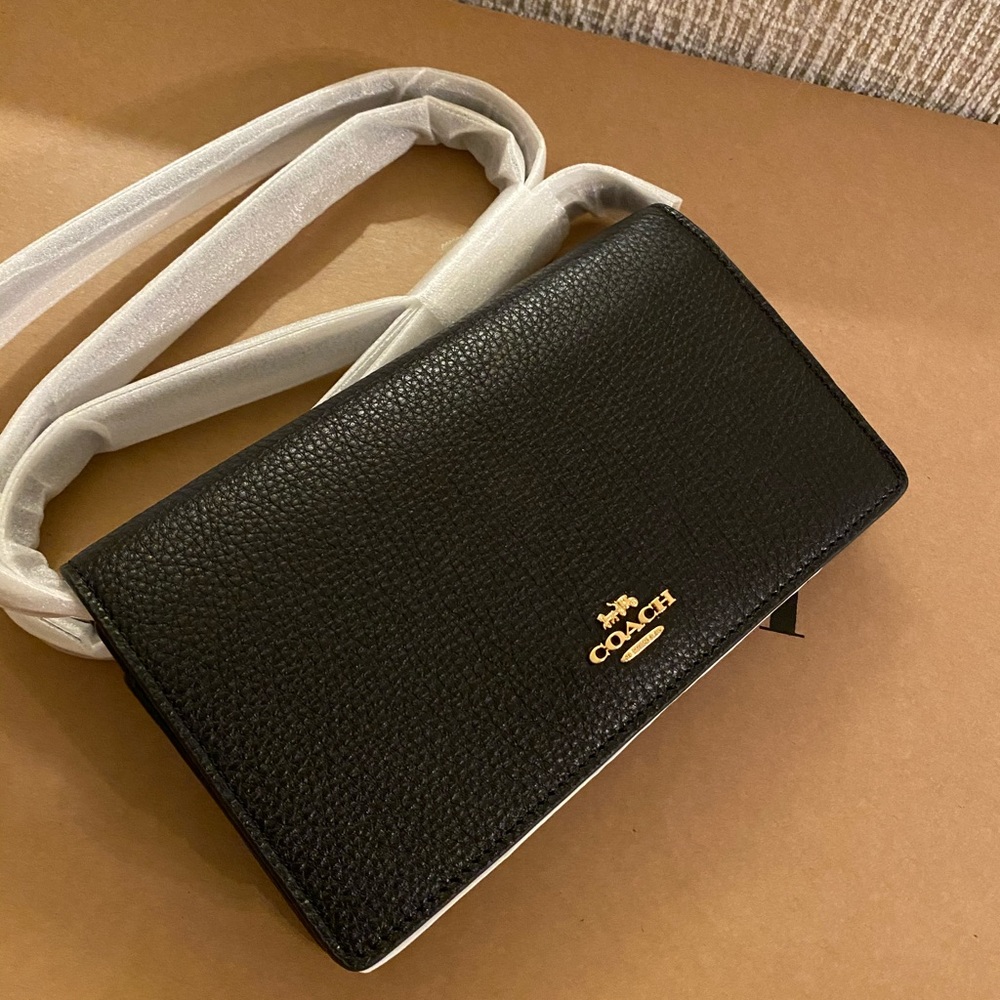 Coach Crossbody Clutch. New with tag.